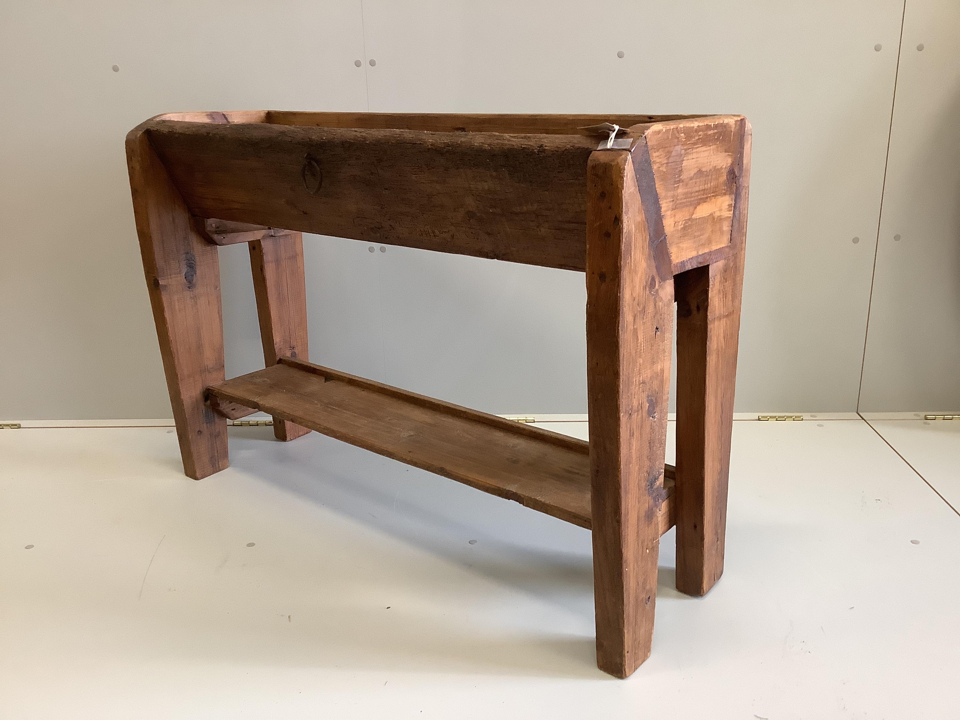 A French provincial pine and fruitwood trough, width 114cm, depth 38cm, height 79cm